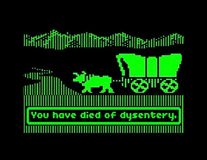 Green Apple II Oregon Trail death screen with a covered wagon and the message You have died of dysentery.